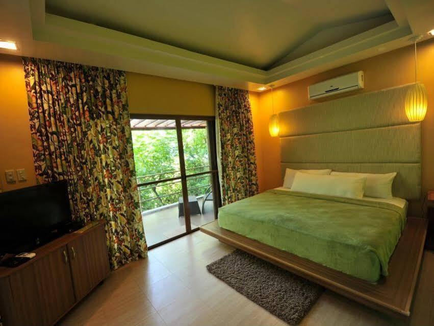Tugawe Cove Resort Colongcocon Bagian luar foto